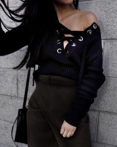 LA blogger Tania Sarin with lace up sweater
