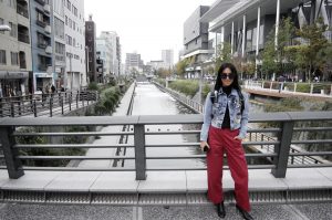 LA blogger Tania Sarin traveling in tokyo wearing red pants
