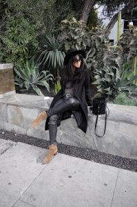 LA blogger Tania Sarin with Saint Laurent booties and hat