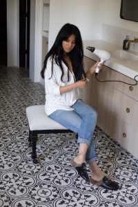 LA Blogger Tania Sarin with t3 blowdryer and gucci mule slippers