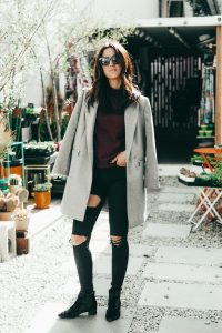 LA blogger Tania Sarin in NY Magazine with velvet booties and ripped jeans