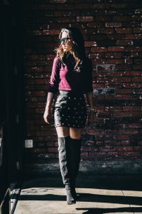 LA blogger Tania Sarin in NY Magazine with mini studded skirt and knee high boots