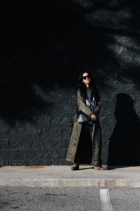 LA Blogger Tania Sarin in louis vuitton combat boots and olive trench