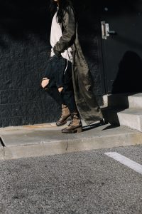 LA Blogger Tania Sarin in louis vuitton combat boots and olive trench