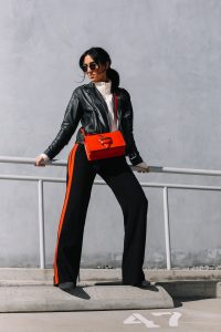 LA Blogger Tania Sarin in laer moto jacket and loewe bag