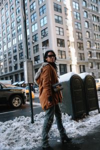 LA Blogger Tania Sarin in New York during NYFW in celine sunglasses and gucci padlock crossbody