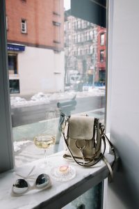 LA Blogger Tania Sarin in New York during NYFW flatlay with chloe mini backpack