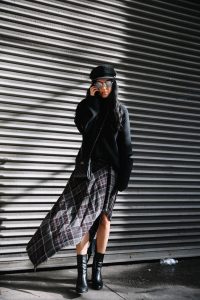 LA Blogger Tania Sarin in New York during NYFW in chauffeur hat and public school skirt