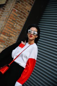 LA Blogger Tania Sarin in New York during NYFW in red lip and loewe bag