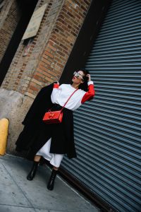 LA Blogger Tania Sarin in New York during NYFW in red lip and loewe bag