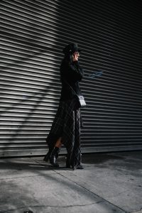 LA Blogger Tania Sarin in New York during NYFW in chauffeur hat and public school skirt