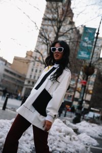 LA Blogger Tania Sarin in New York during NYFW with enfold top and louis vuitton clutch
