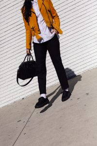 LA Blogger Tania Sarin in yellow moto jacket and givenchy bag
