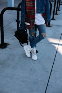 LA Blogger Tania Sarin in offwhite plaid top, levis denim jacket, and timberland boots