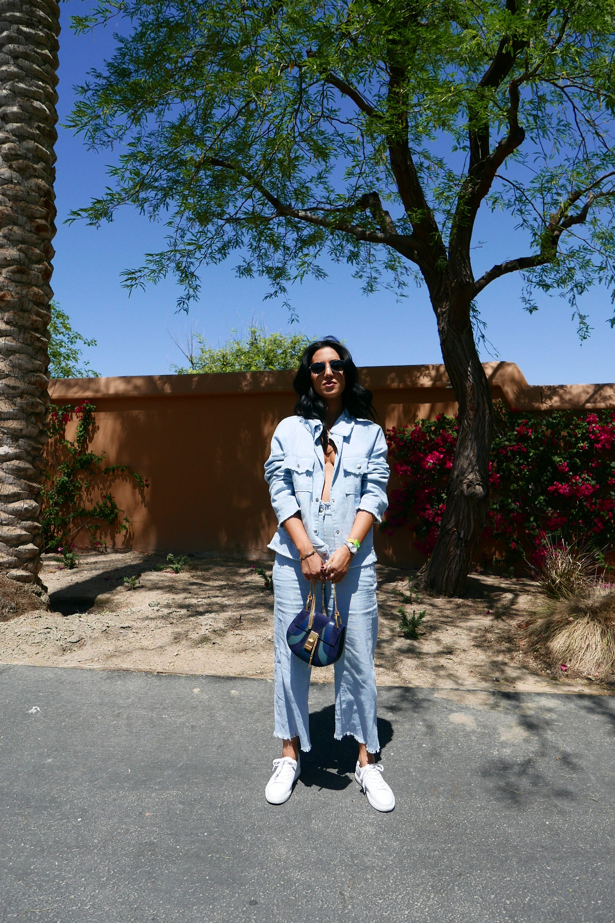 LA Blogger Tania Sarin on coachella weekend featuring festival style with moonriver two piece set and navy chloe crossbody bag