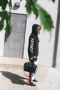LA Blogger Tania Sarin in offwhite denim jacket and givenchy bag