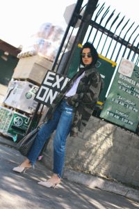 LA Blogger Tania Sarin in camo jacket, prada shoes, goyard tote