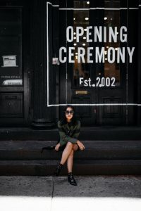 LA Blogger Tania Sarin in New York City wearing Veda jacket and raquel allegra mini skirt in front of opening ceremony