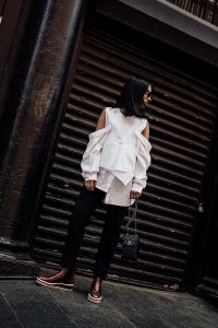 LA Blogger Tania Sarin in NYC wearing enfold cold shoulder top and prada booties