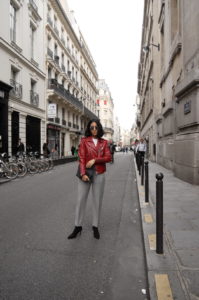 LA Blogger Tania Sarin in Paris during PFW wearing coach red leather and heeled boot heels.