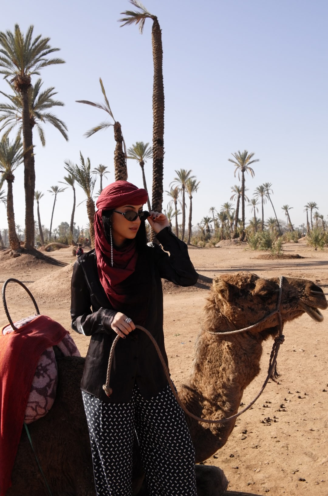 LA Blogger Tania Sarin in Marrakech Morocco travel scene with camel