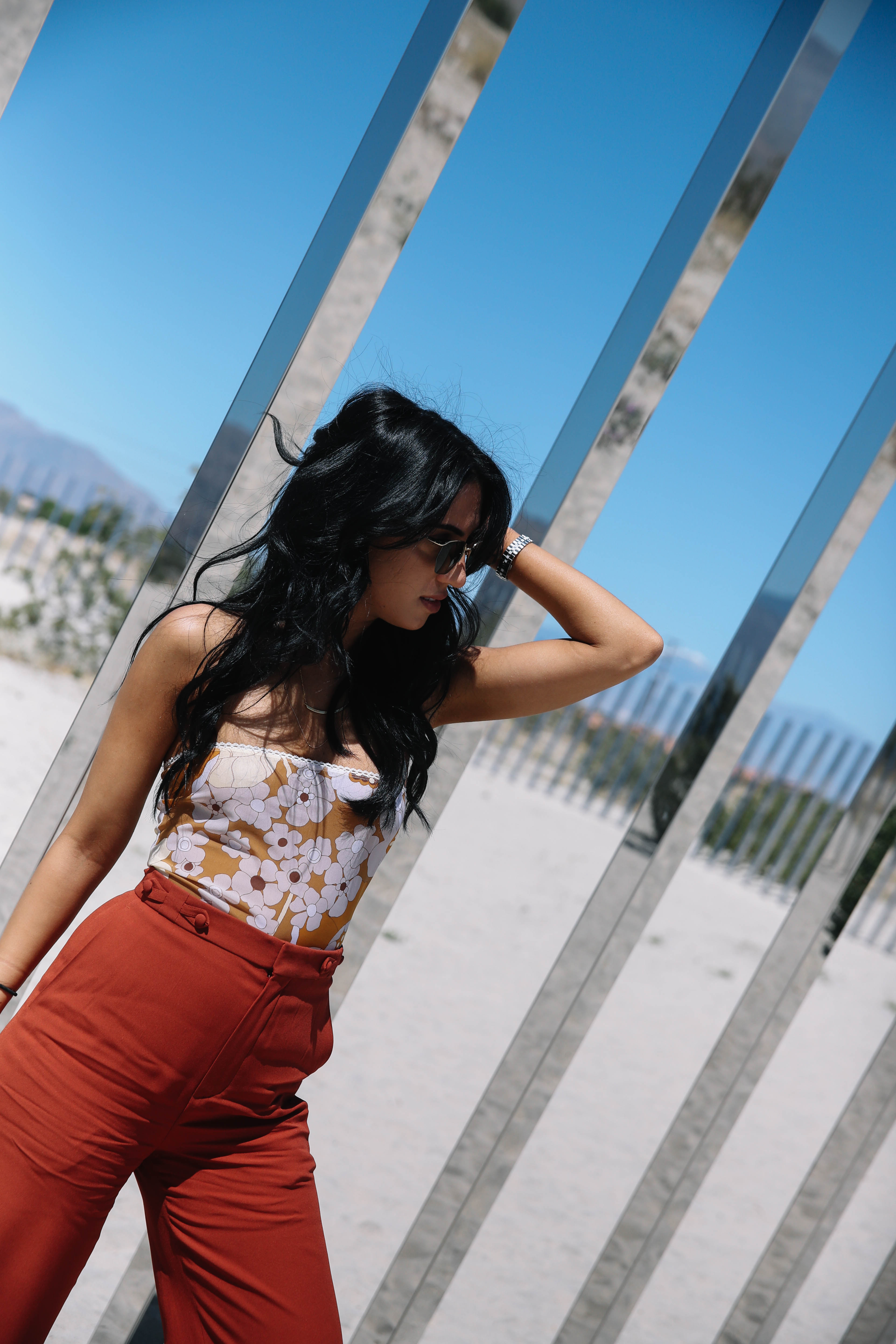 LA Blogger Tania Sarin on coachella weekend featuring festival style with chloe strapless floral body suit at palm desert mirror exhibit