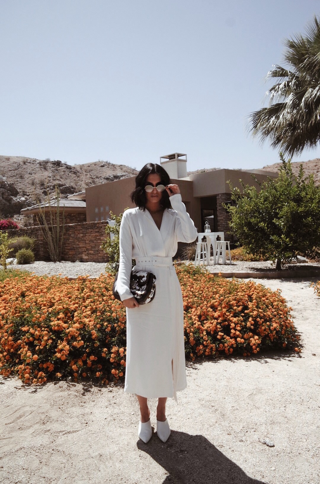 LA blogger Tania Sarin wearing Rachel Comey Sunder dress from shopbop and stella luna mules at coachella with furla bag