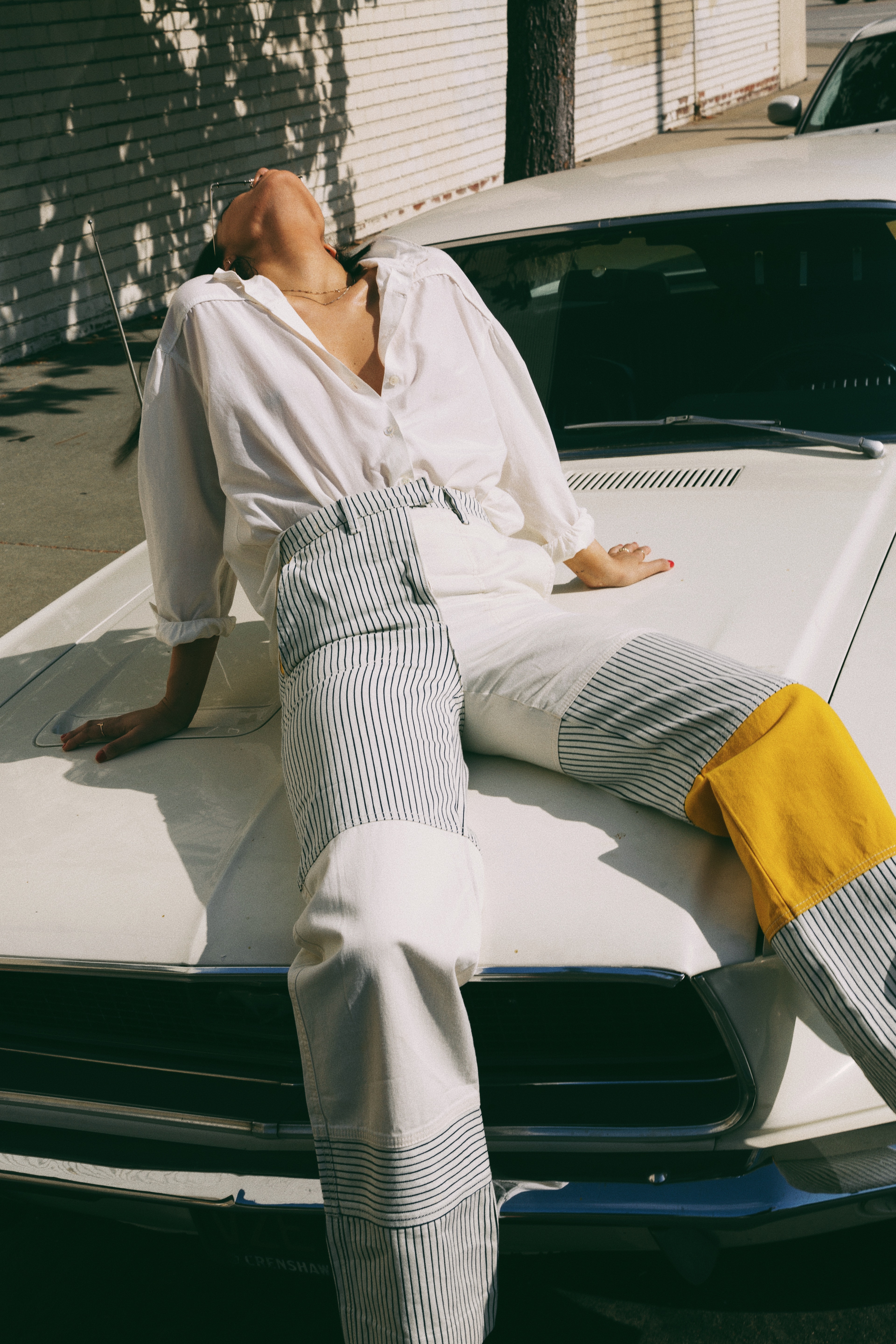 How to Style Statement Pieces | TSARIN.COM | Tory Burch color block pants, Raquel Allegra top, Schutz Shoes