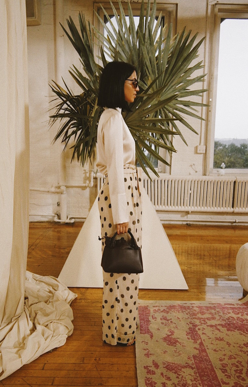What to Wear For a Night Out When It's Cold | TSARIN.com | Silk blouse, polka dot pants, mules, fall 2018 outfit, bucket bag
