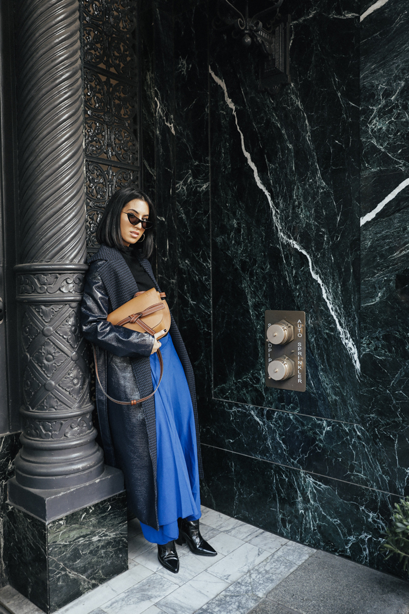 How to Stay Warm Without Sacrificing Style | TSARIN.COM | Blue Skirt, Saddle bag, Long black coat, winter layers